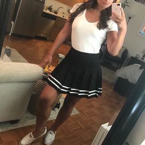 Black pleated mini skirt